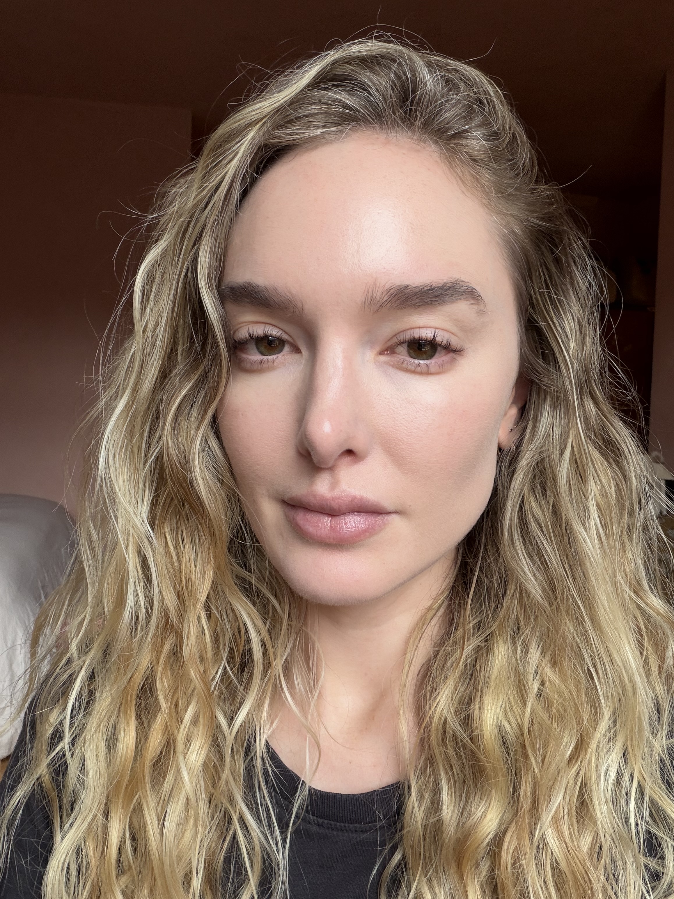 Blonde woman wearing a black T-shirt