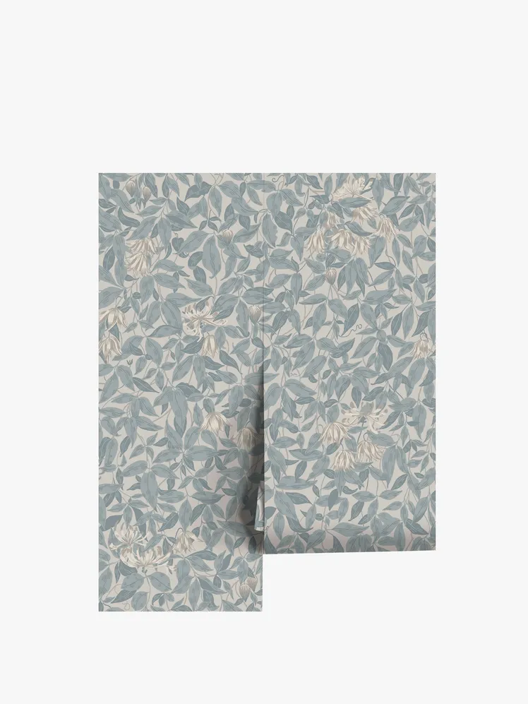 Image may contain: upholstery, rug, cushion, clothing, shorts and chalkboard